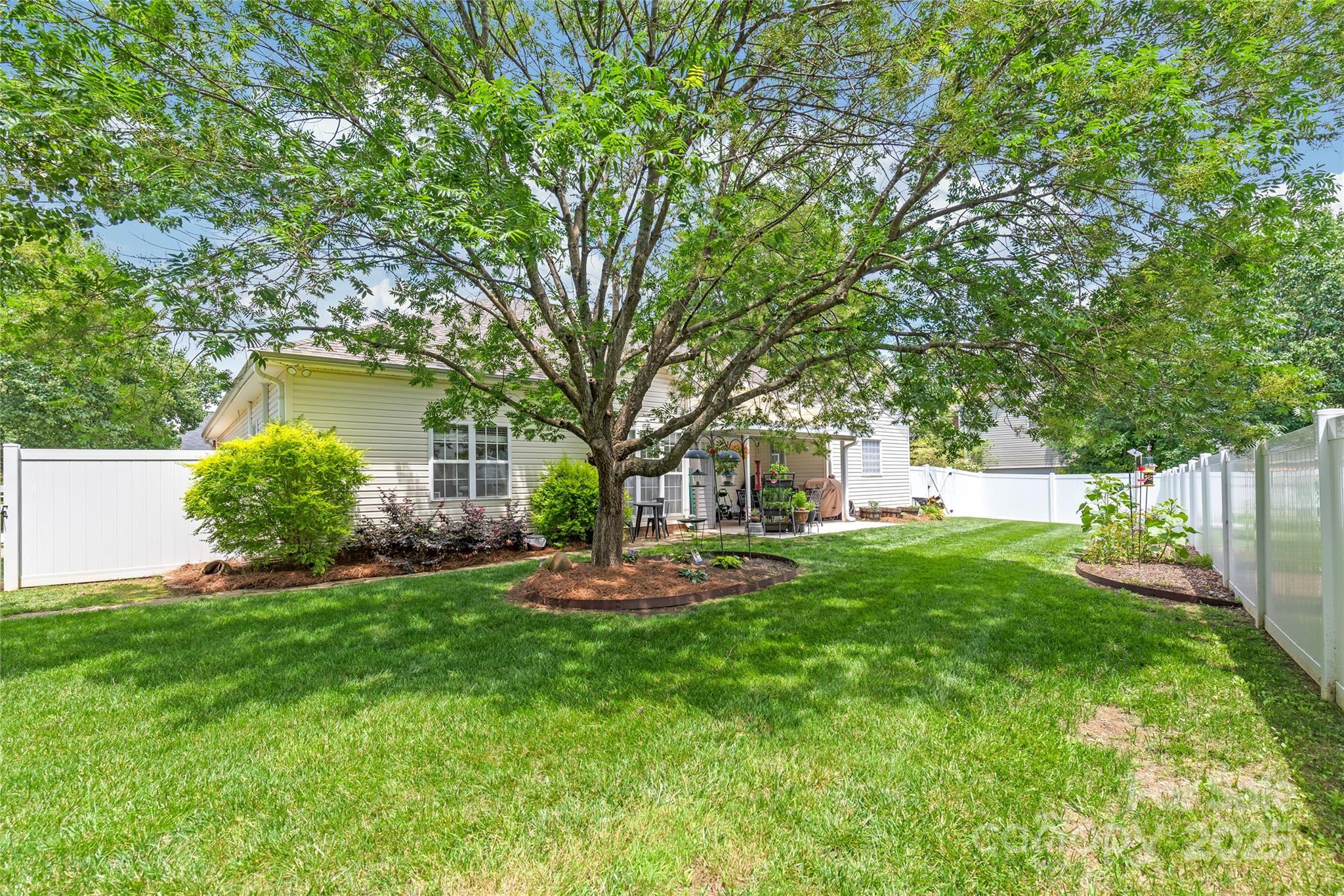 502 Roxanne Court Northwest Concord, NC 28027 - Photo 36 of 40 a front view of a house with a yard and trees