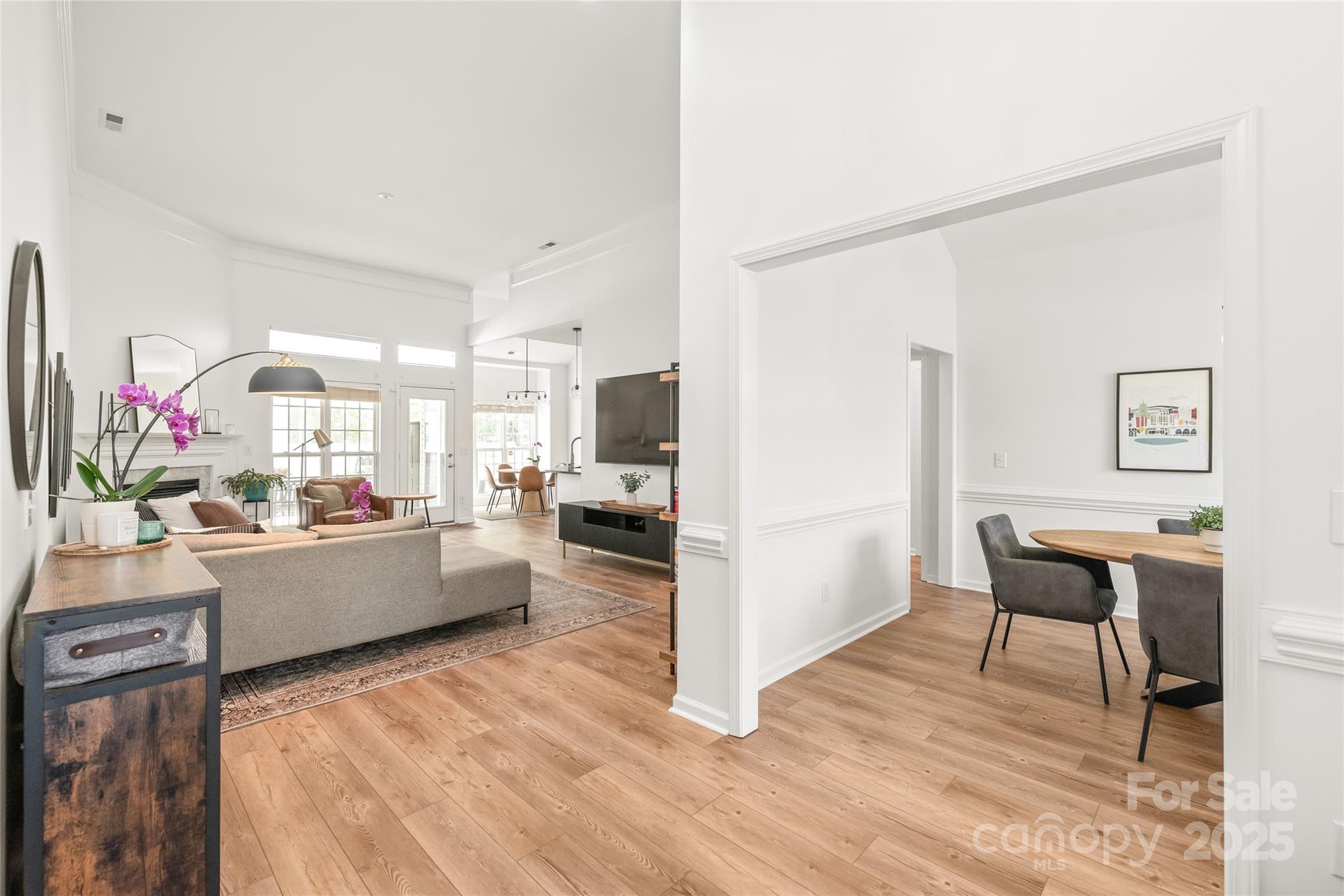 502 Roxanne Court Northwest Concord, NC 28027 - Photo 4 of 40 a kitchen with a table and chairs in it