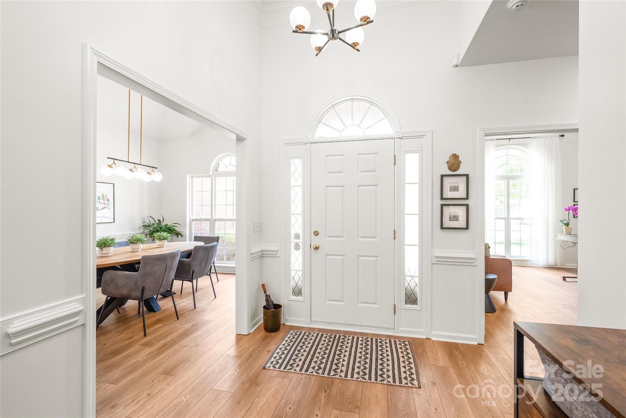 502 Roxanne Court Northwest Concord, NC 28027 - Photo 5 of 40 a view of a livingroom with furniture and hardwood floor