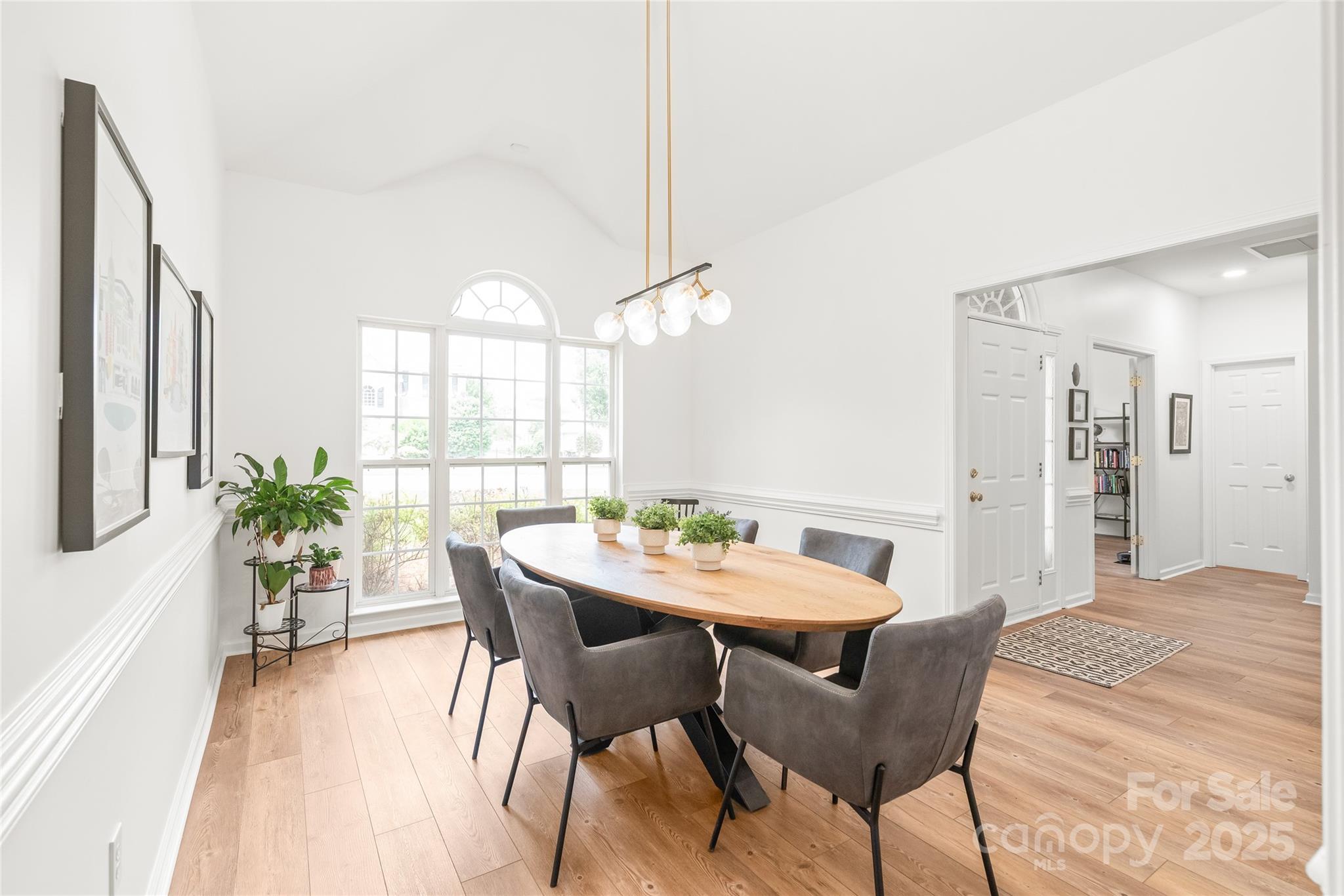 502 Roxanne Court Northwest Concord, NC 28027 - Photo 7 of 40 a view of a dining room with furniture and wooden floor