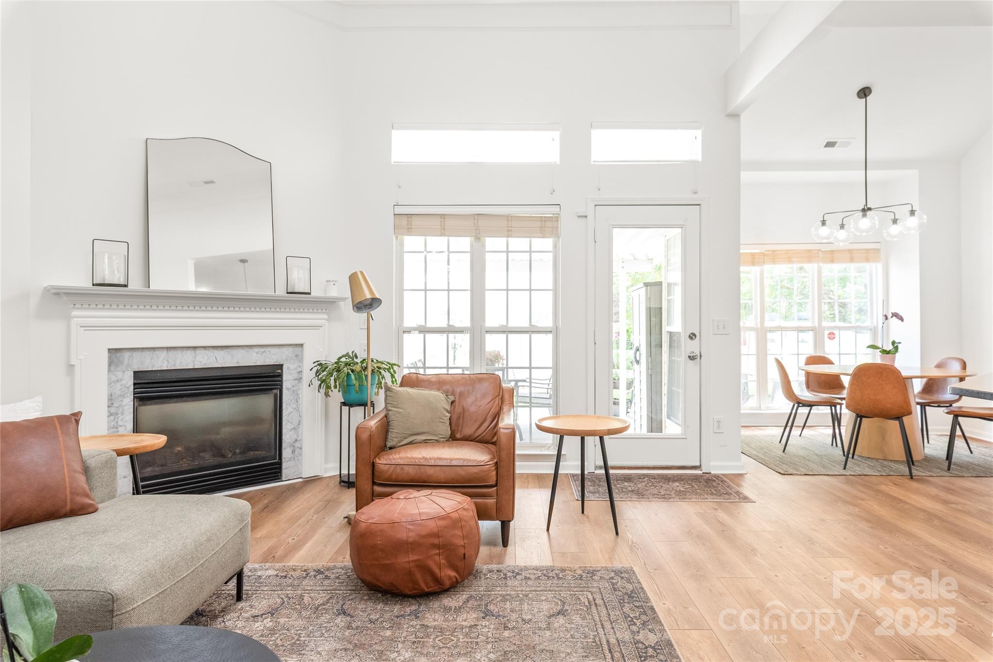 502 Roxanne Court Northwest Concord, NC 28027 - Photo 10 of 40 a living room with furniture and a fireplace