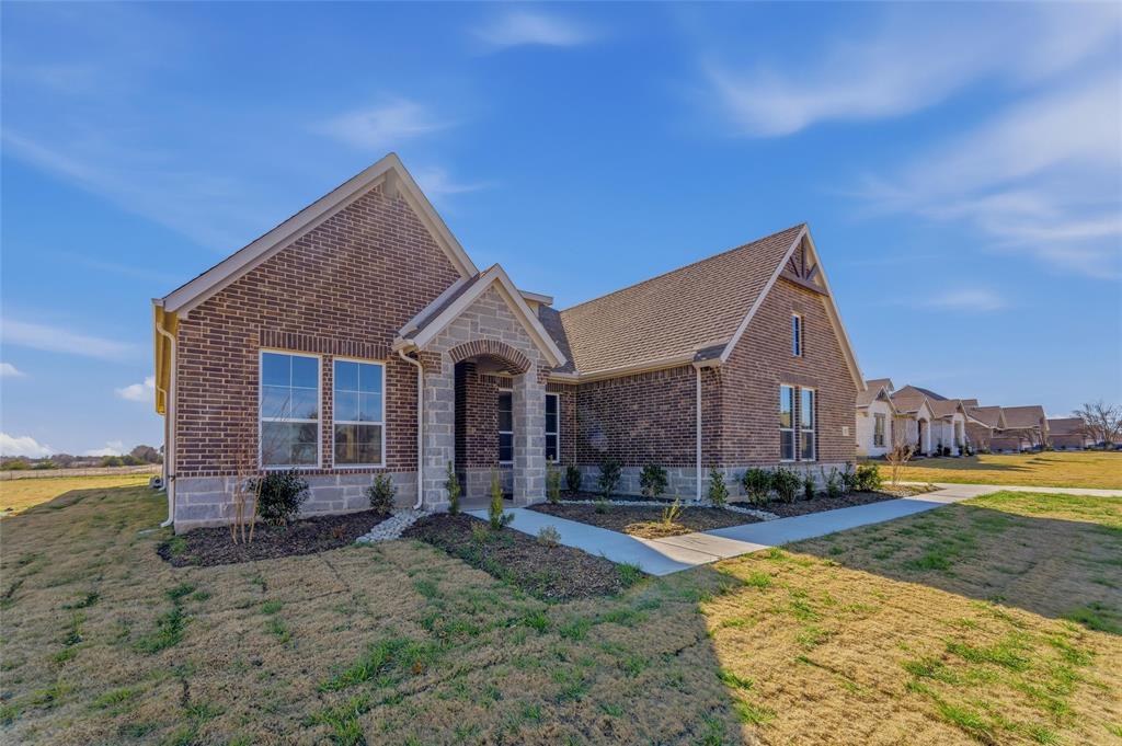 245 Cobb Road Leonard, TX 75452 - Photo 4 of 30 a front view of a house with a yard