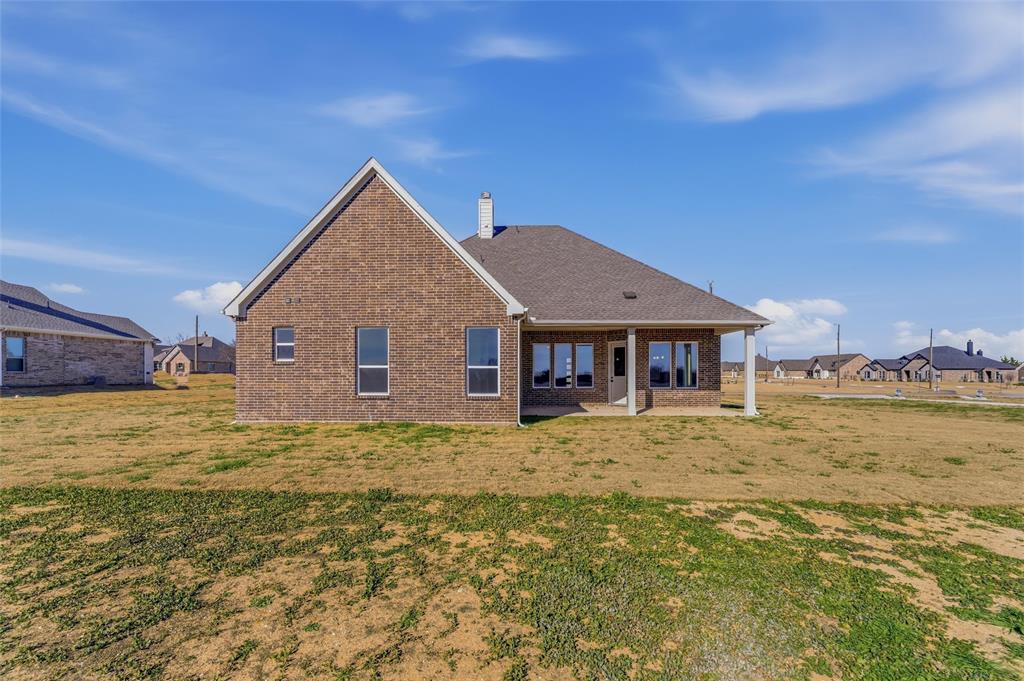 245 Cobb Road Leonard, TX 75452 - Photo 5 of 30 a view of a house with a yard