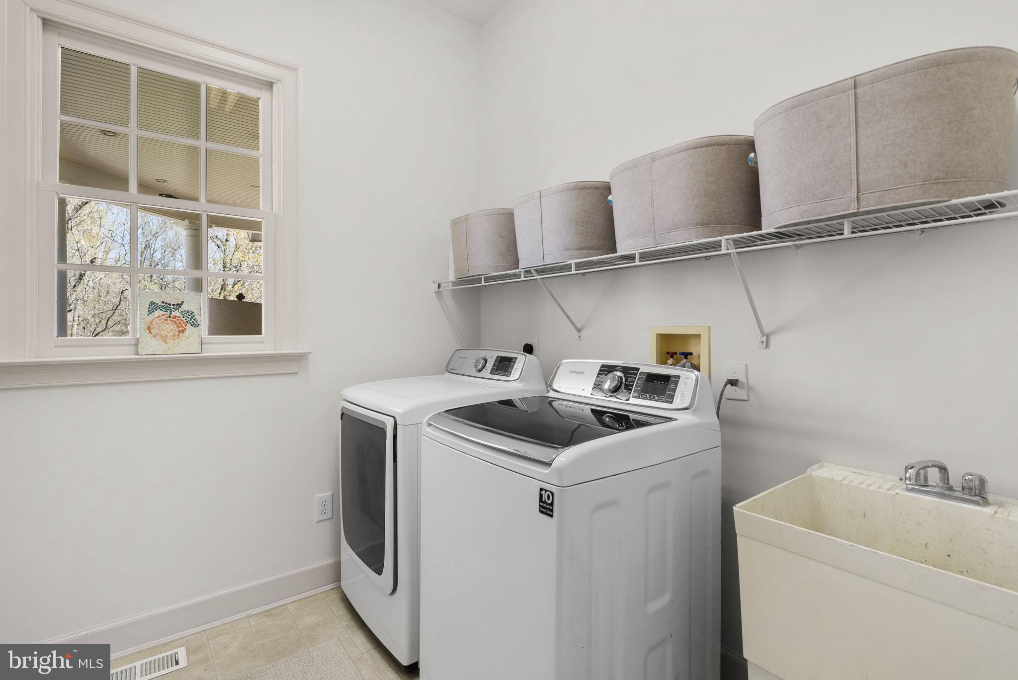 17516 Ashton Green Drive Sandy Spring, MD 20860 - Photo 32 of 60 a utility room with dryer and washer