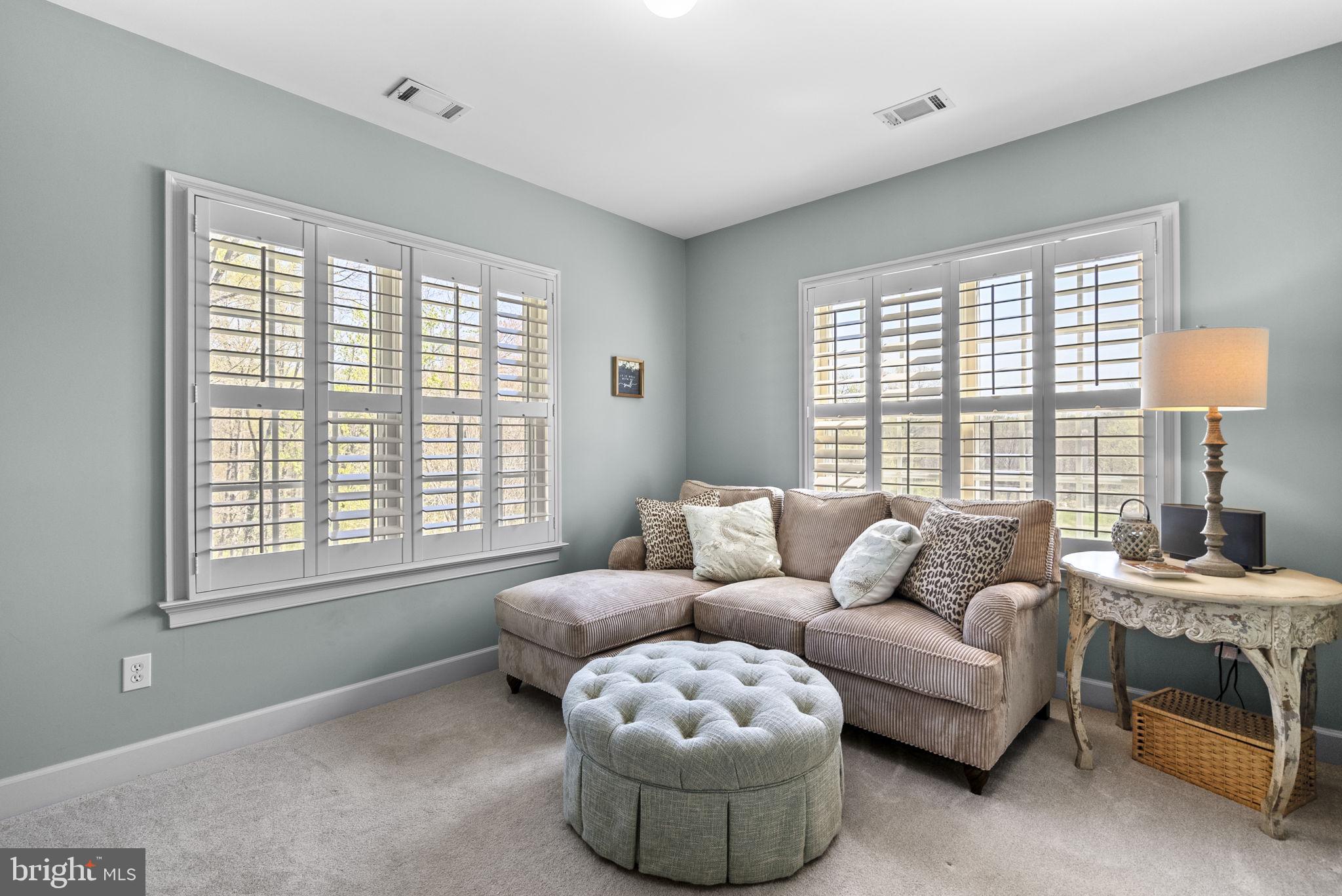 17516 Ashton Green Drive Sandy Spring, MD 20860 - Photo 39 of 60 a living room with furniture and a large window
