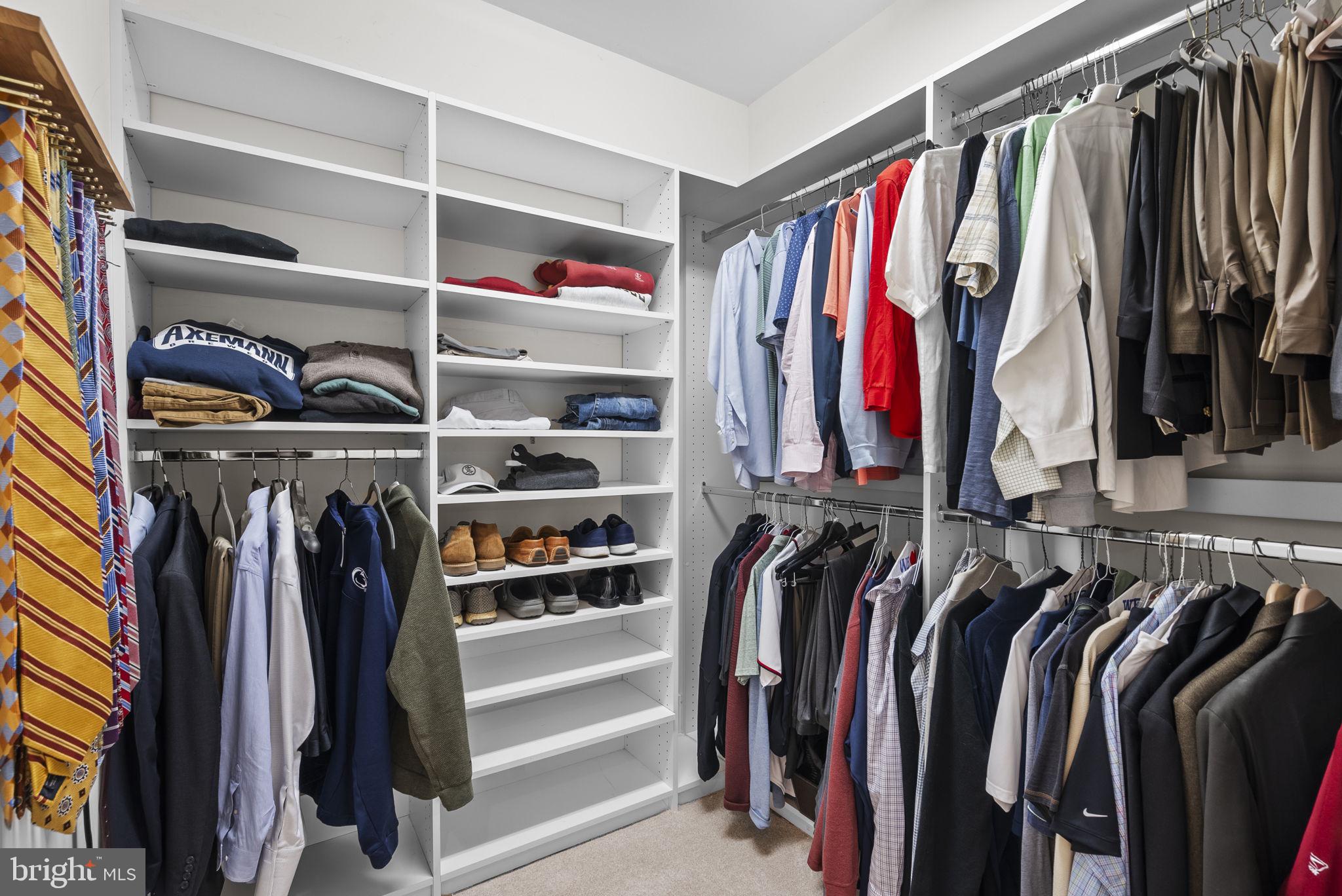 17516 Ashton Green Drive Sandy Spring, MD 20860 - Photo 42 of 60 a view of walk in closet with clothes and shoes