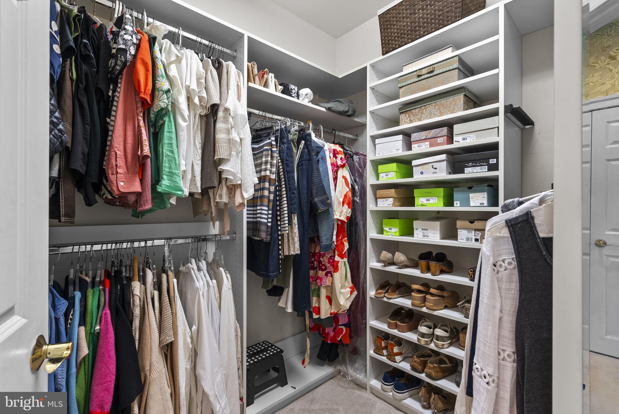 17516 Ashton Green Drive Sandy Spring, MD 20860 - Photo 43 of 60 a view of walk in closet with clothes and shoes