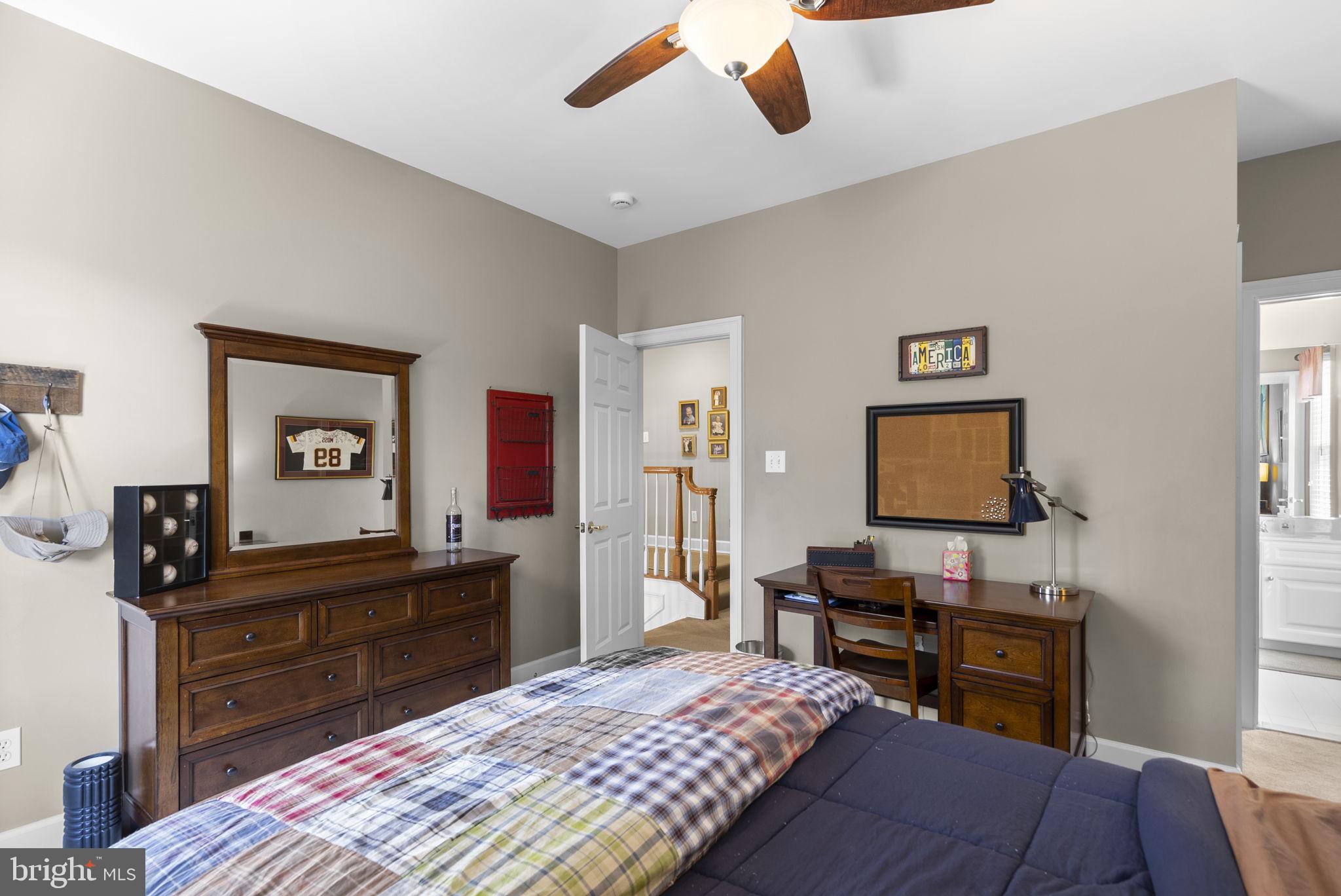 17516 Ashton Green Drive Sandy Spring, MD 20860 - Photo 47 of 60 a bedroom with a bed and furniture
