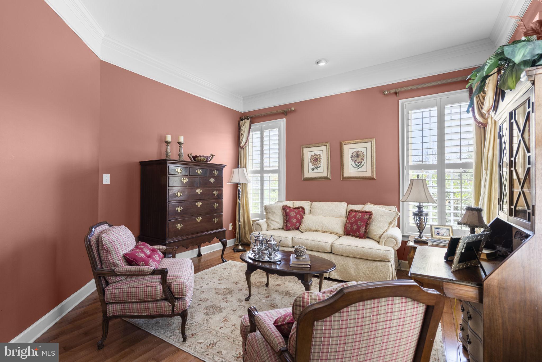 17516 Ashton Green Drive Sandy Spring, MD 20860 - Photo 7 of 60 a living room with furniture and large windows