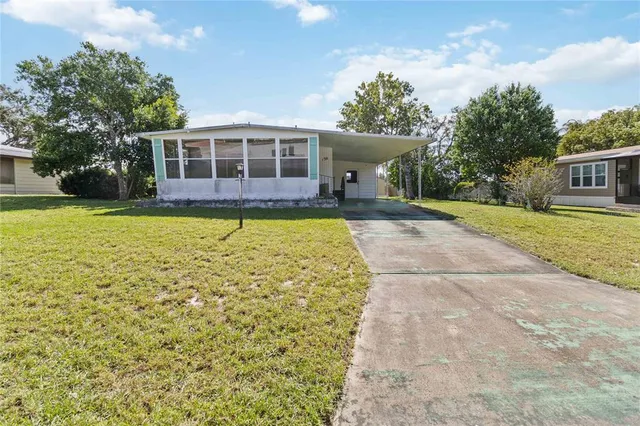 a view of a house with a swimming pool
