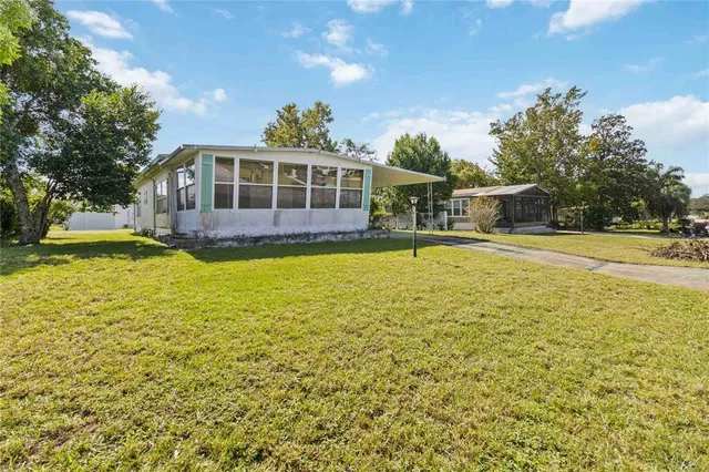 a view of a house with a swimming pool