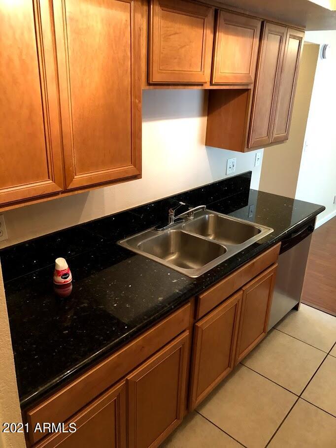 740 West Elm Street, Unit 160 Phoenix, AZ 85013 - Photo 15 of 26 a close view of sink and microwave