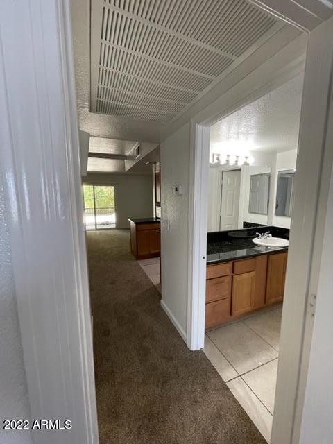740 West Elm Street, Unit 160 Phoenix, AZ 85013 - Photo 21 of 26 a view of kitchen with refrigerator and window