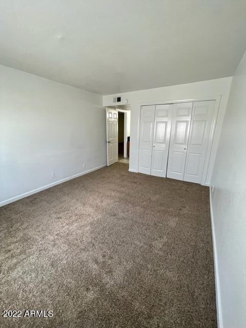 740 West Elm Street, Unit 160 Phoenix, AZ 85013 - Photo 25 of 26 an empty room with windows