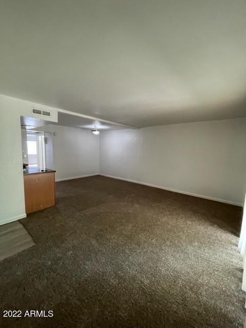 740 West Elm Street, Unit 160 Phoenix, AZ 85013 - Photo 10 of 26 a view of a room with wooden floor