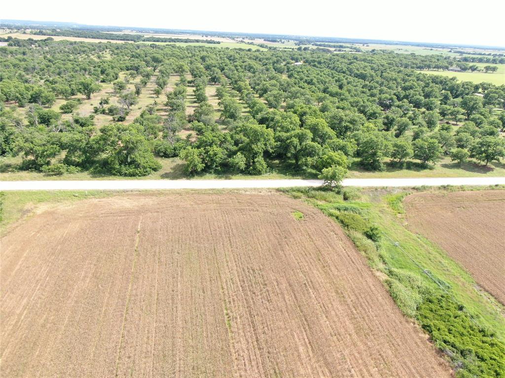 183 North West Rising Star, TX 76471 - Photo 7 of 17 a view of a yard with an outdoor space