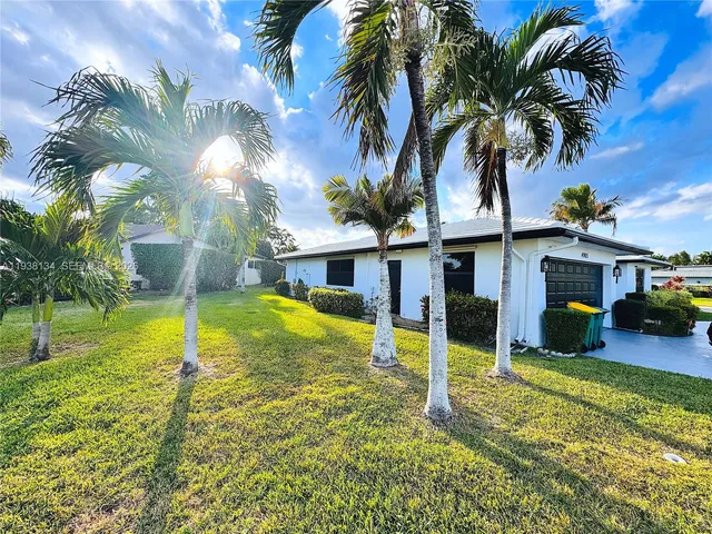 a view of a house with swimming pool