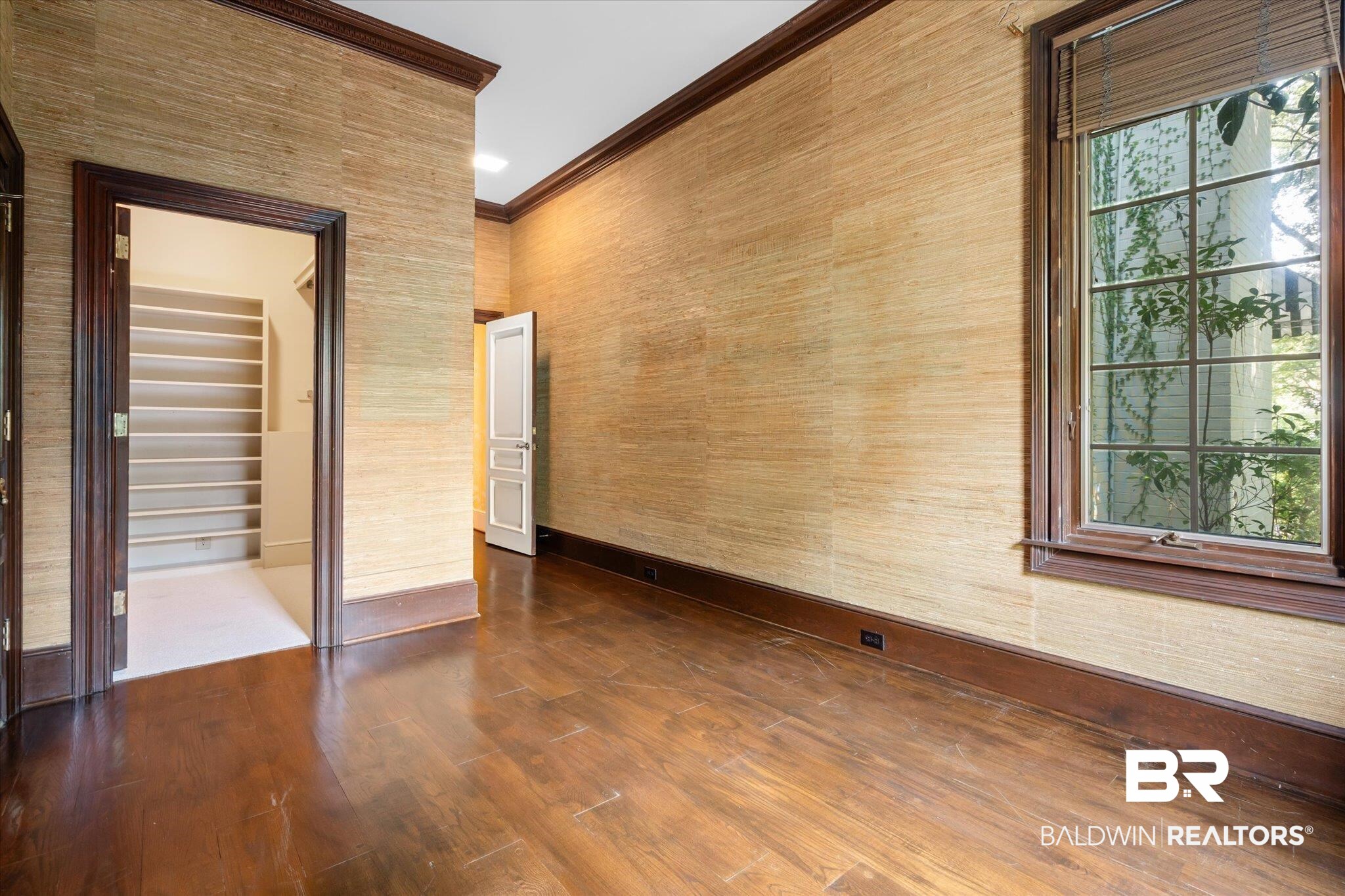 54 Turnin Lane Mobile, AL 36608 - Photo 21 of 35 Empty room with ornamental molding and hardwood / wood-style floors