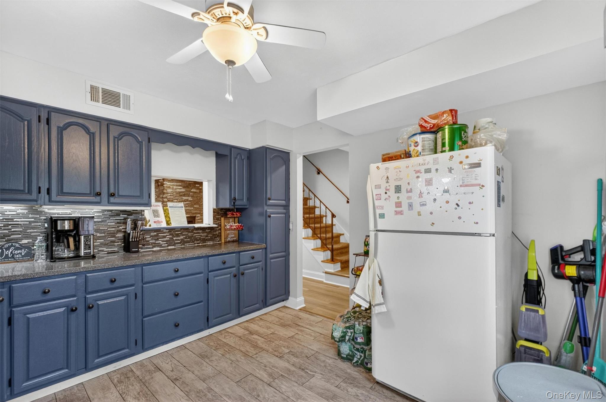 1 Merrywood Road Poughkeepsie, NY 12601 - Photo 18 of 49 a kitchen with stainless steel appliances granite countertop a refrigerator and a stove top oven