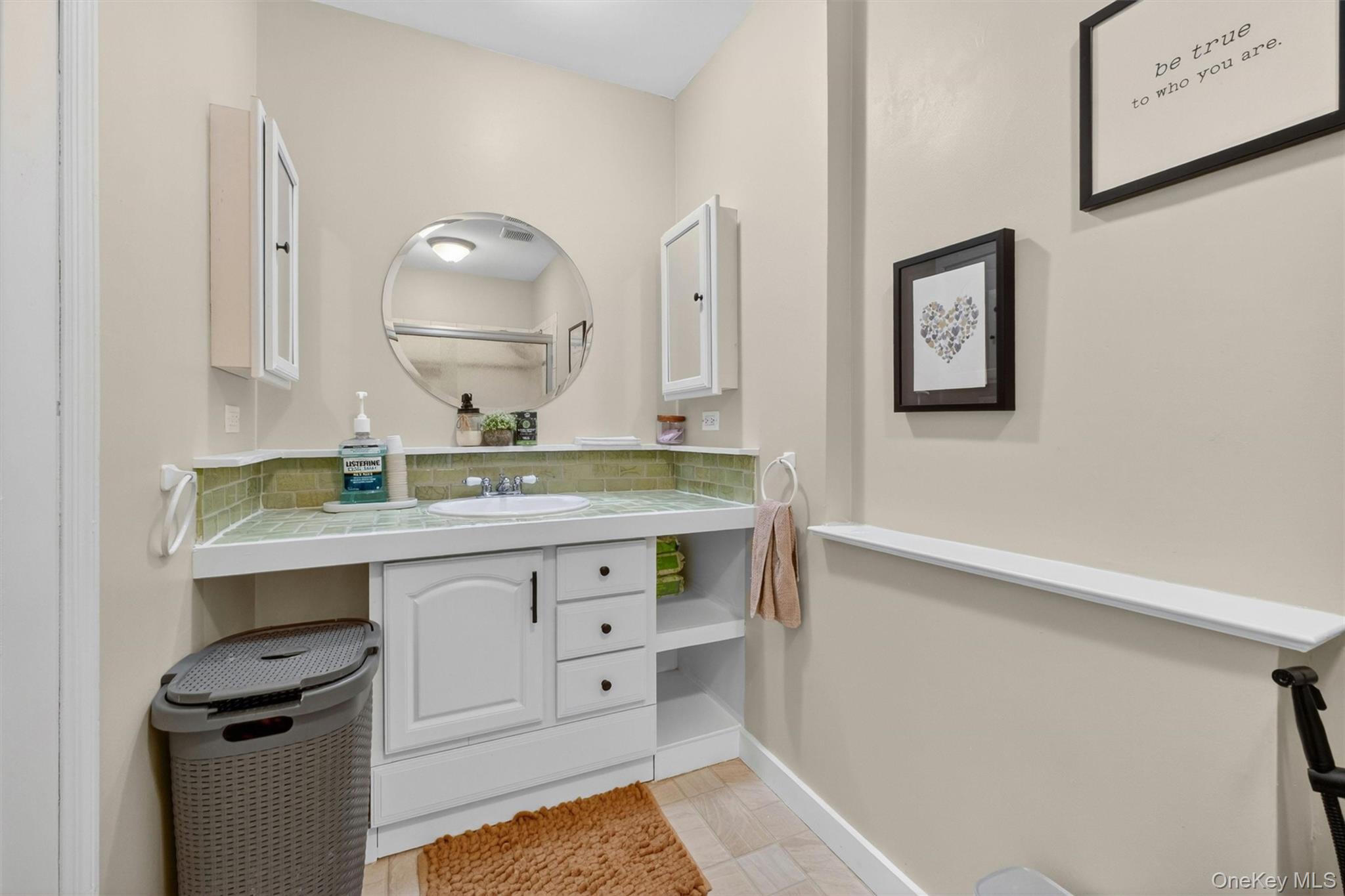1 Merrywood Road Poughkeepsie, NY 12601 - Photo 24 of 49 a bathroom with a sink vanity and mirror