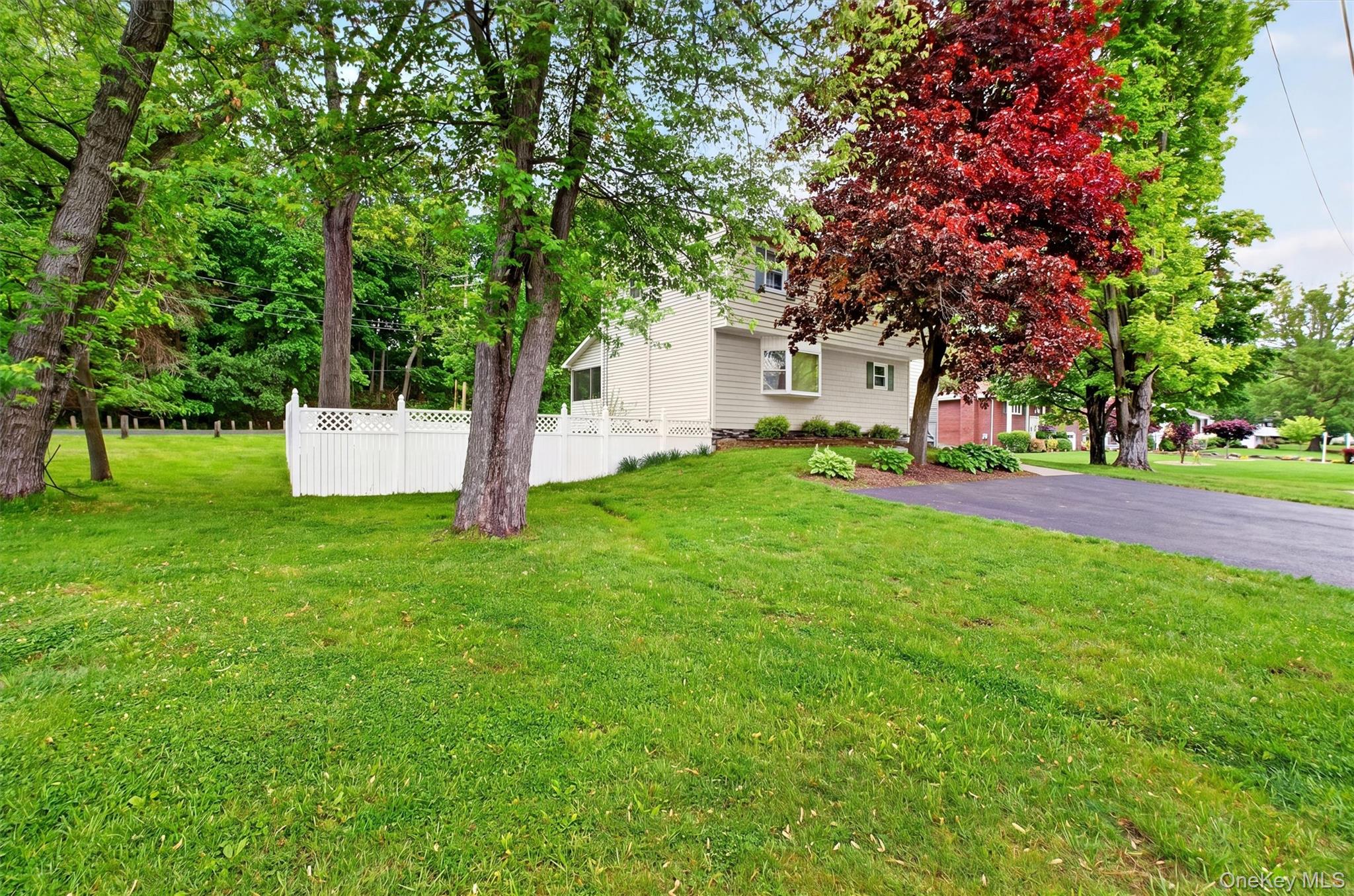 1 Merrywood Road Poughkeepsie, NY 12601 - Photo 3 of 49 a view of a house with a yard and tree s