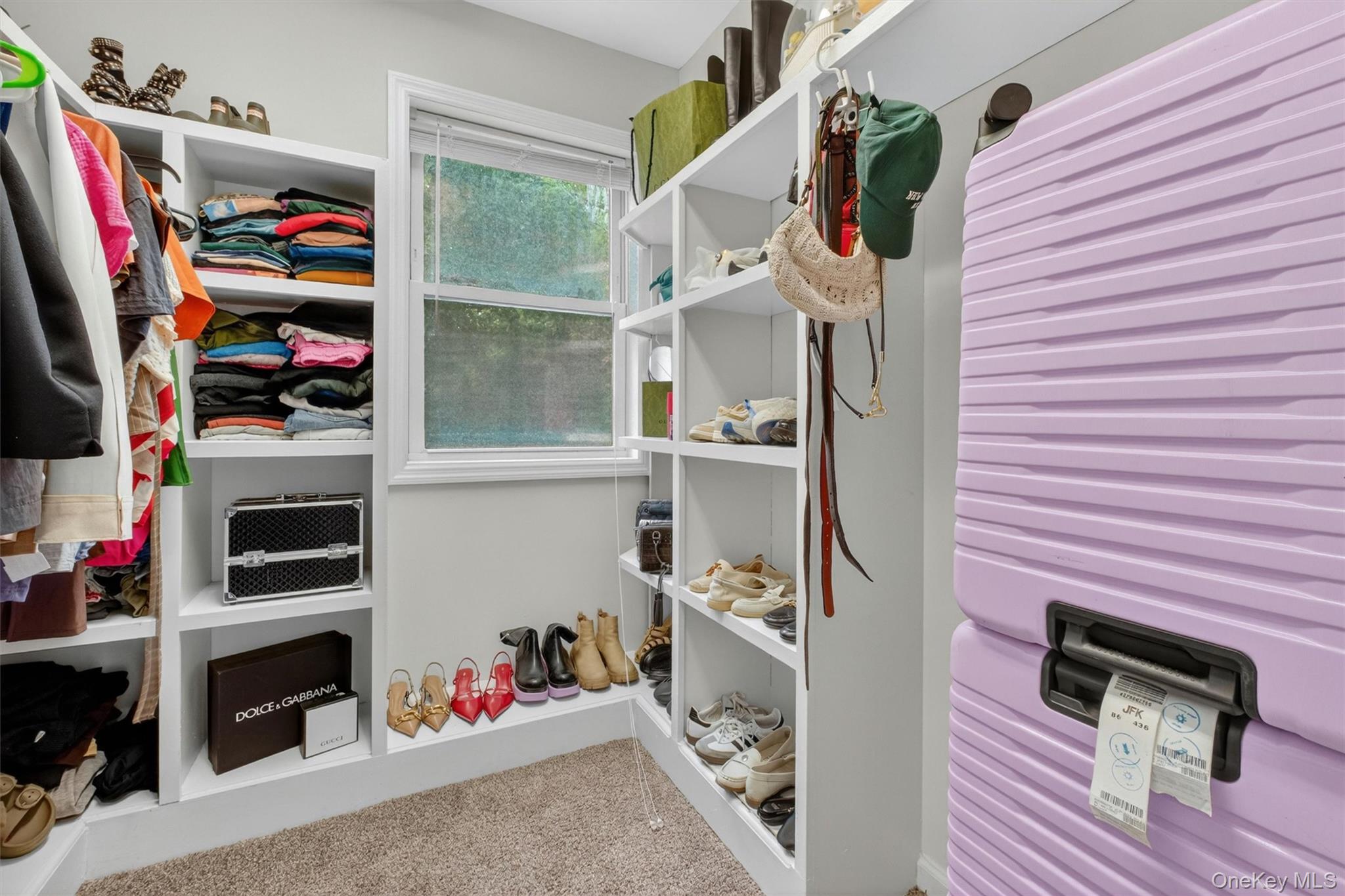 1 Merrywood Road Poughkeepsie, NY 12601 - Photo 31 of 49 a view of walk in closet with clothes and shoes