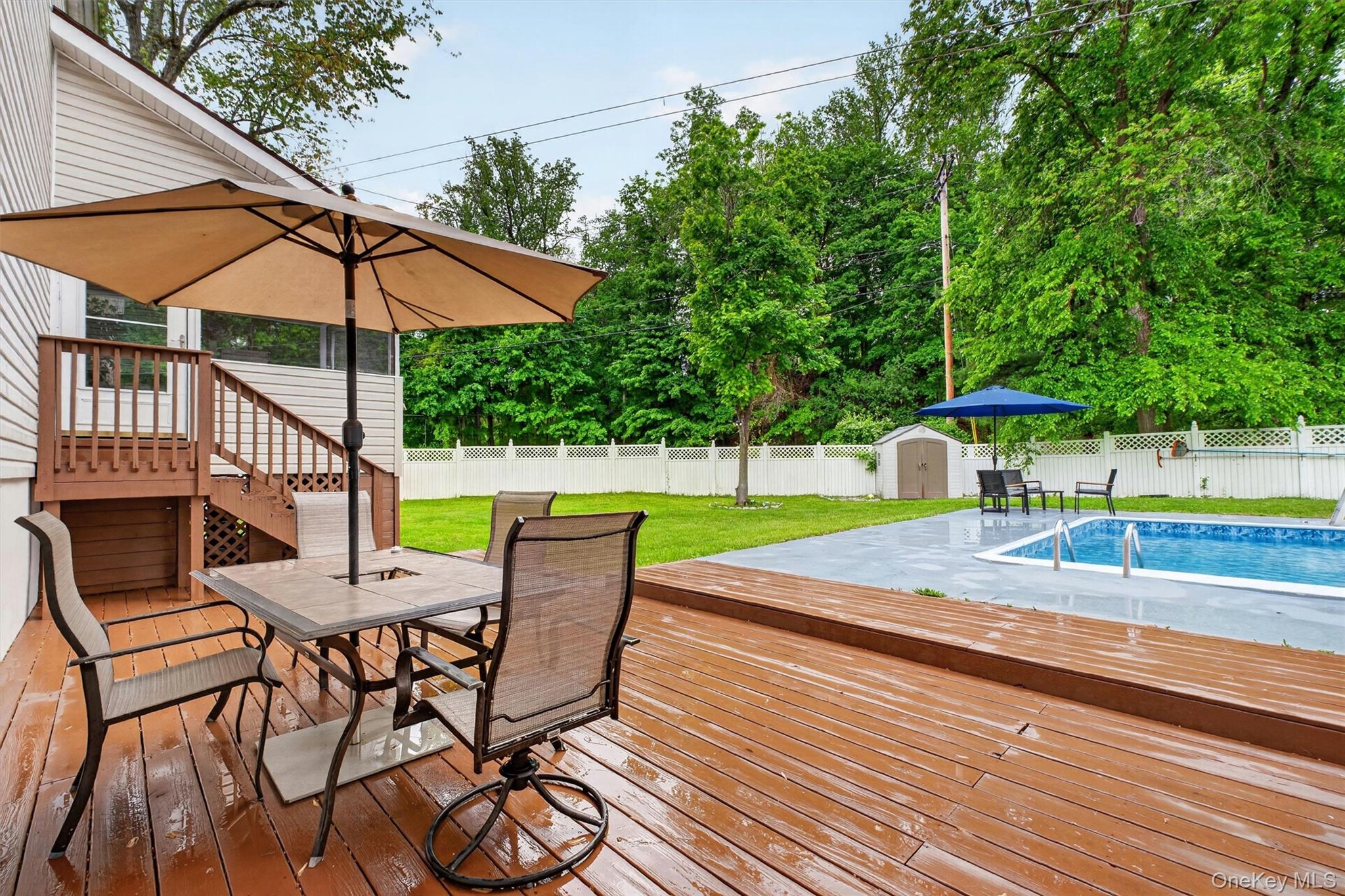 1 Merrywood Road Poughkeepsie, NY 12601 - Photo 40 of 49 a view of a chairs and table in the backyard