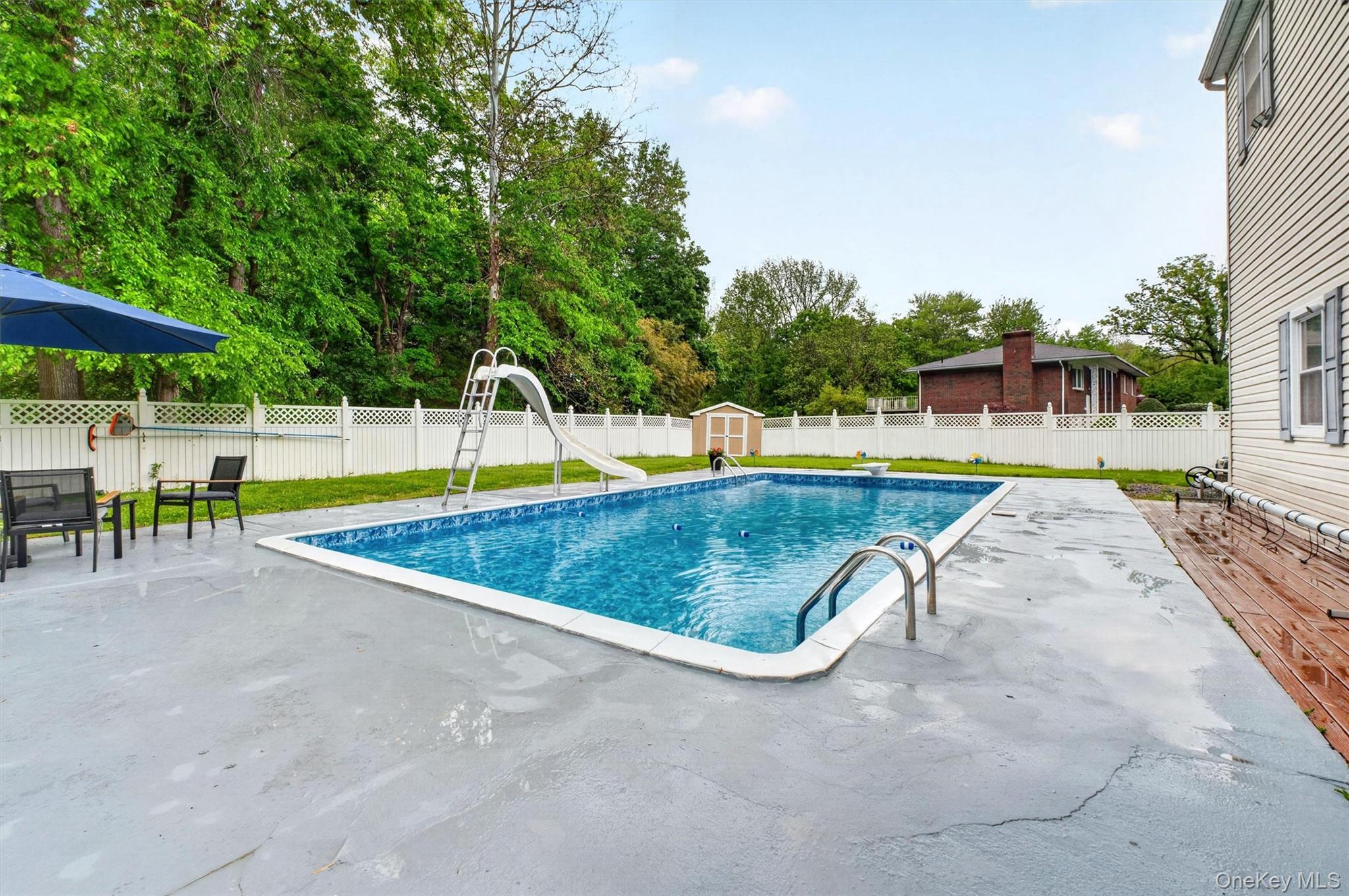 1 Merrywood Road Poughkeepsie, NY 12601 - Photo 43 of 49 a view of a swimming pool with a patio