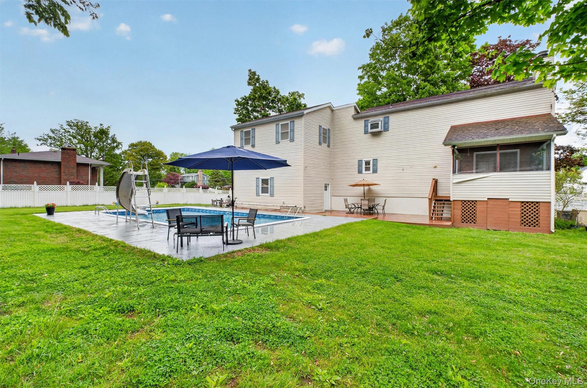 1 Merrywood Road Poughkeepsie, NY 12601 - Photo 44 of 49 a view of a house with backyard and sitting area