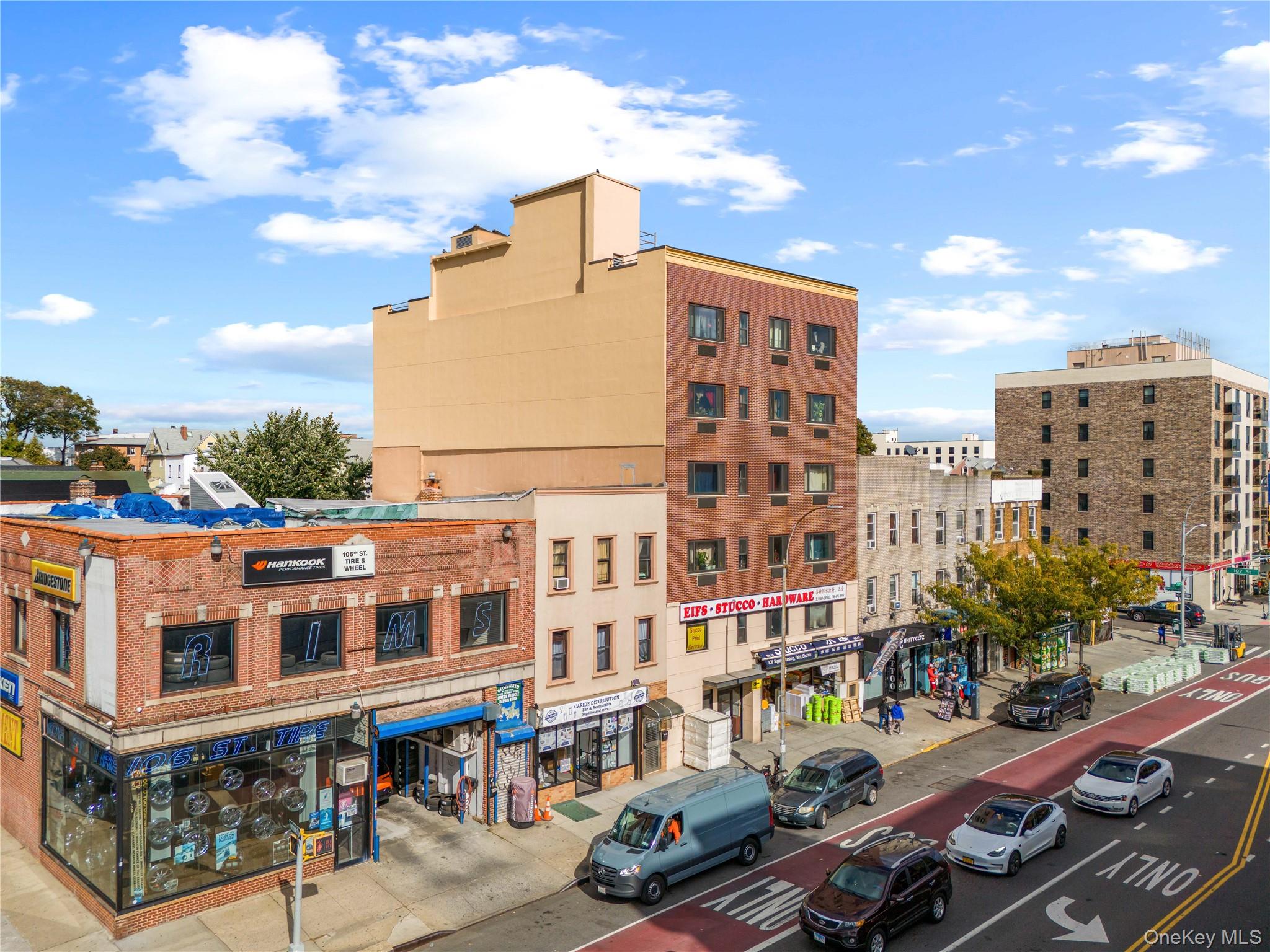 106-07 Northern Boulevard, Unit 5B Queens, NY 11368 - Photo 16 of 18 a city view with tall buildings