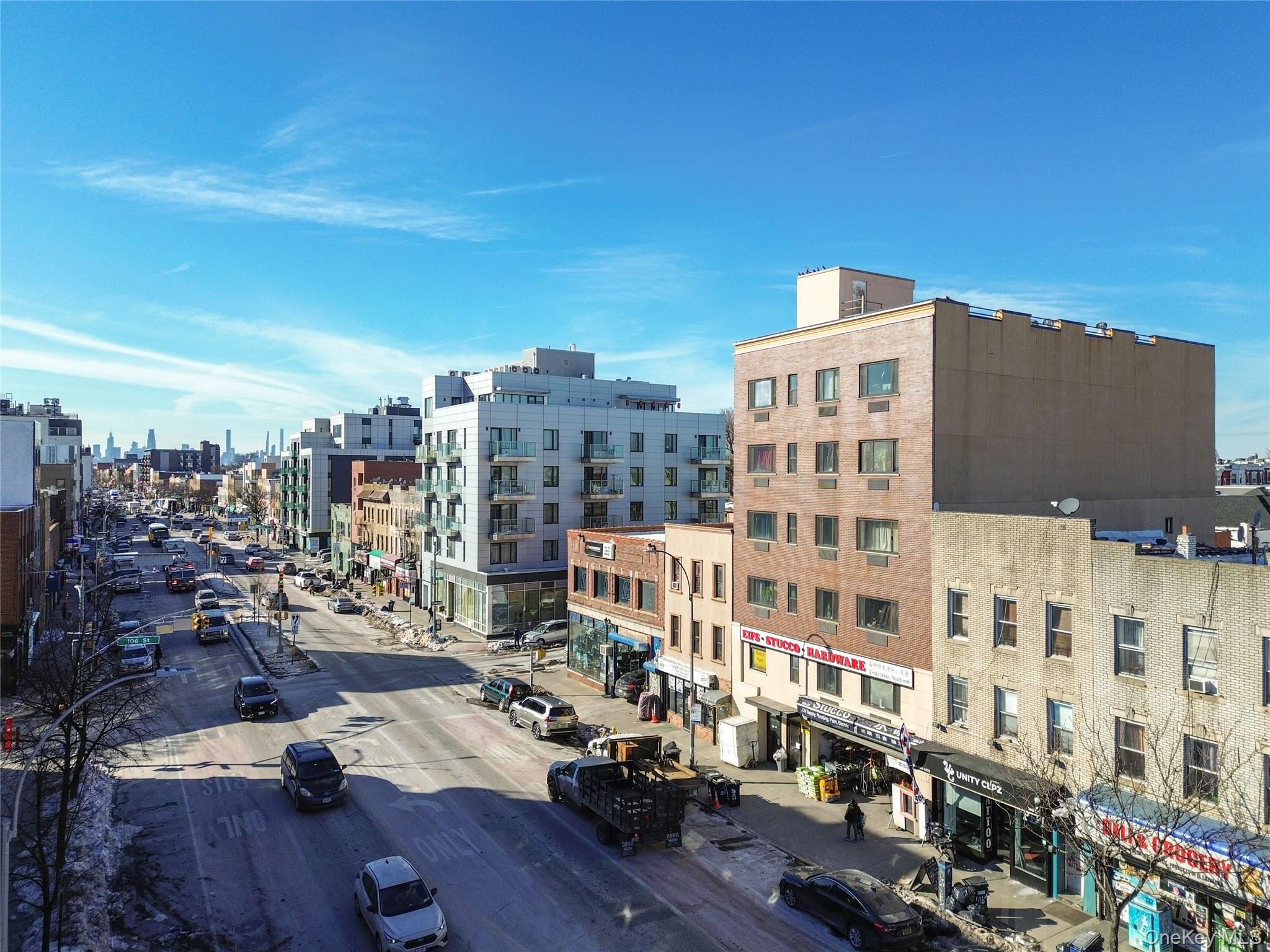 106-07 Northern Boulevard, Unit 5B Queens, NY 11368 - Photo 18 of 19 a city view with tall buildings