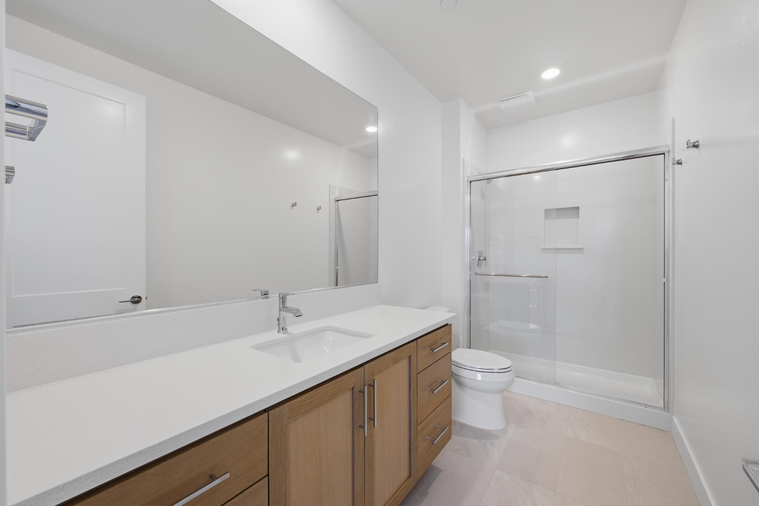 751 Bandera Drive Rocklin, CA 95765 - Photo 22 of 23 a bathroom with a sink a toilet and shower