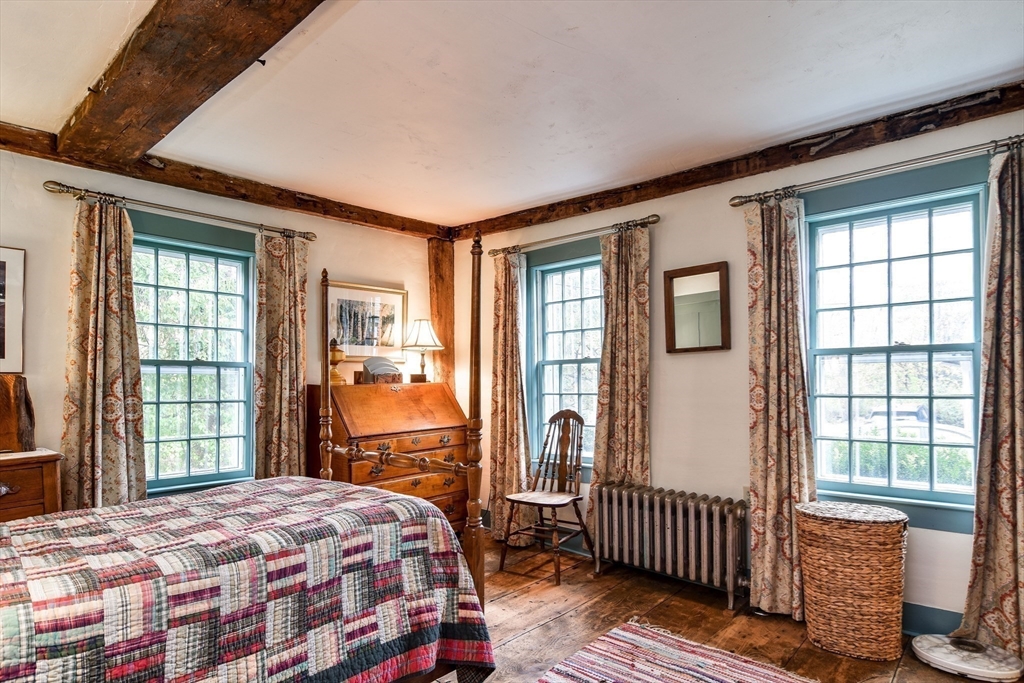 86 Fowler Street Upton, MA 01568 - Photo 17 of 42 a bedroom with a bed and a window