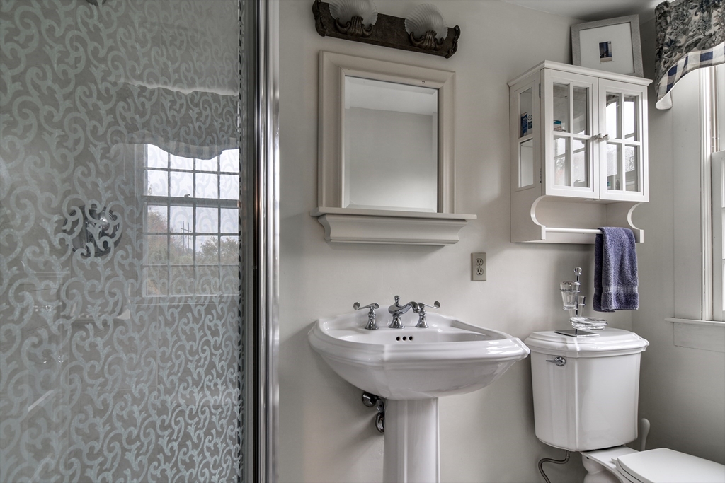 86 Fowler Street Upton, MA 01568 - Photo 22 of 42 a bathroom with a sink a toilet and shower