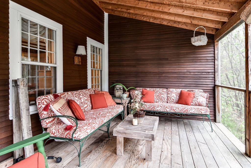 86 Fowler Street Upton, MA 01568 - Photo 24 of 42 a view of outdoor seating space with wooden floor