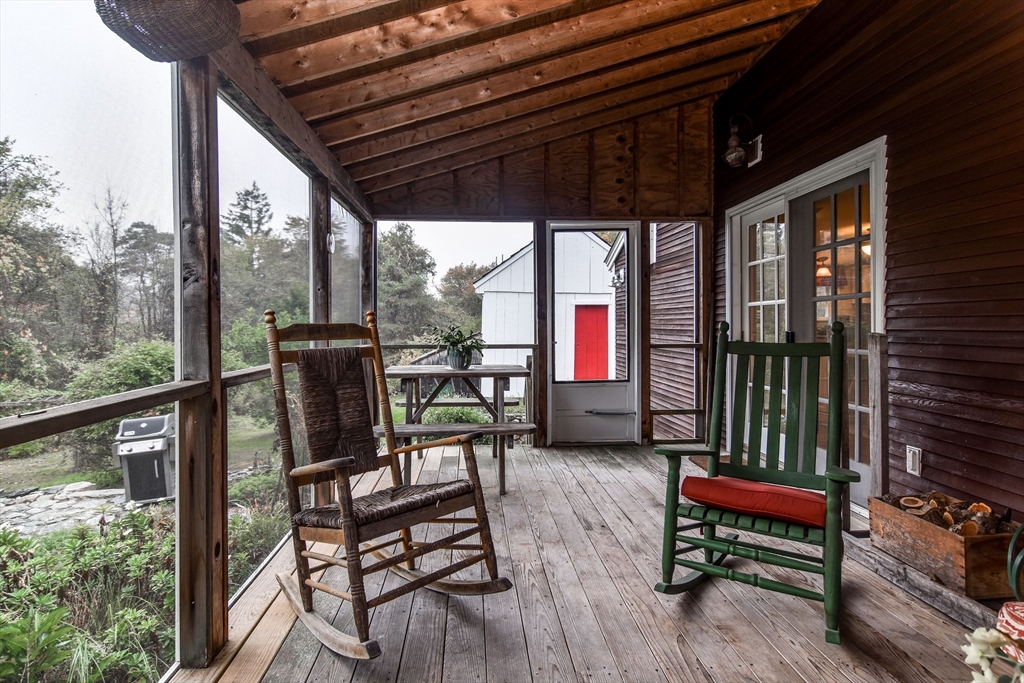 86 Fowler Street Upton, MA 01568 - Photo 27 of 42 a view of a chairs and table in the balcony