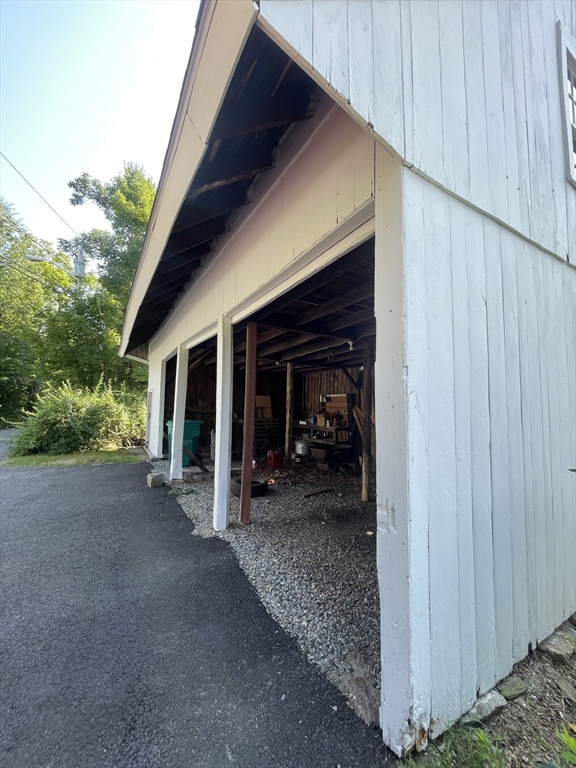 86 Fowler Street Upton, MA 01568 - Photo 41 of 42 a view of a house with backyard space and porch