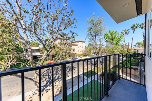 a view of a balcony with an outdoor space
