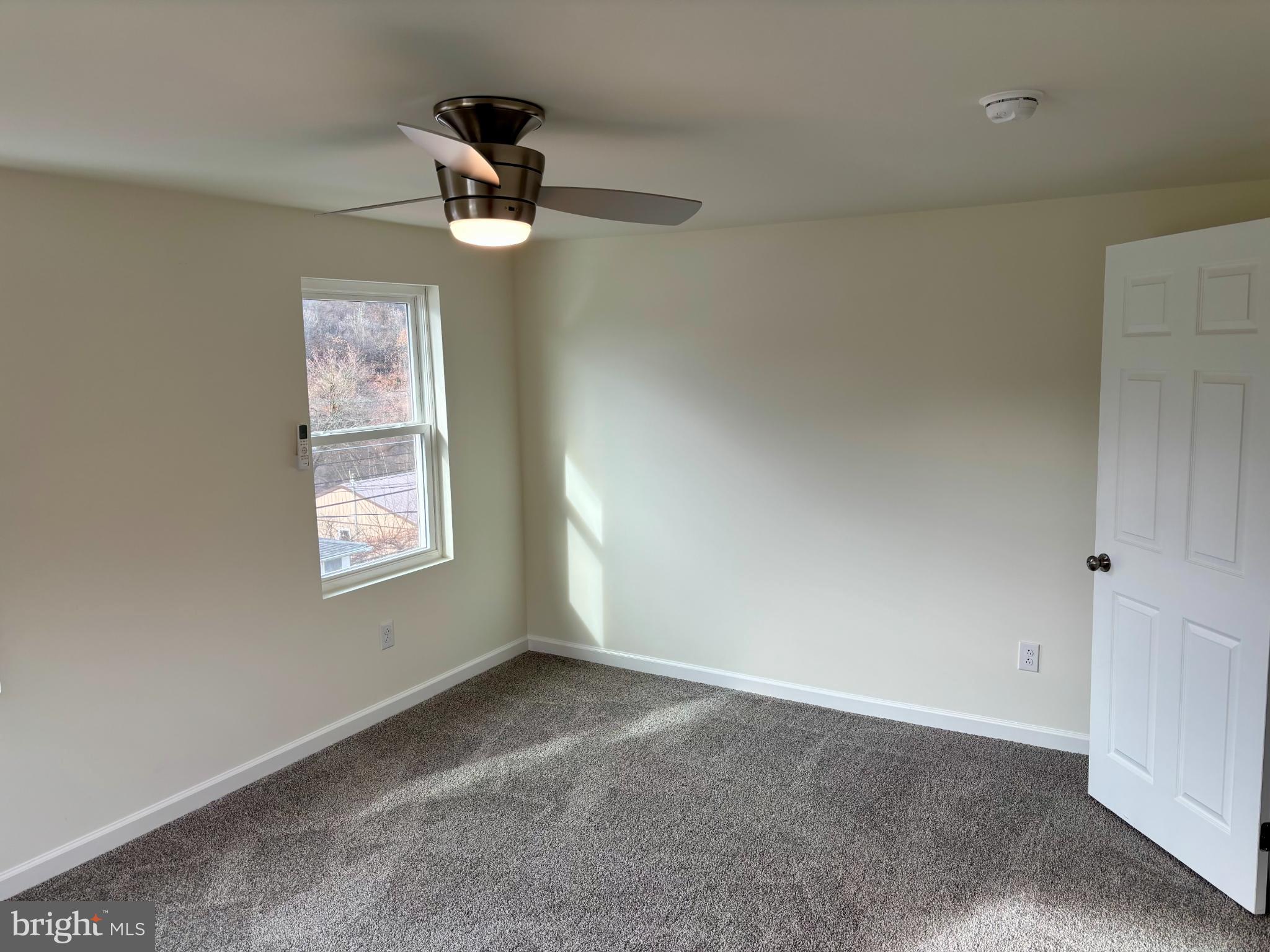 253 Main Street Parryville, PA 18071 - Photo 14 of 30 Bright and airy room with modern ceiling fan.