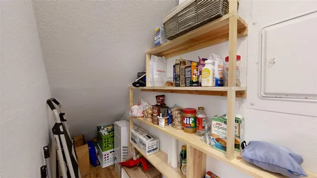 a bathroom with a shower and toilet
