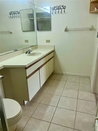 view of a bathroom with a bathtub and a sink