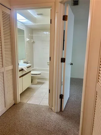 an empty room with a fireplace