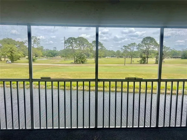 a view of a large window with an outdoor space