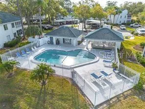 a view of a house with a swimming pool