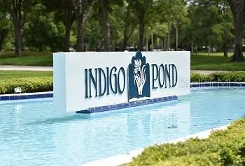 a view of a golf course with a lake