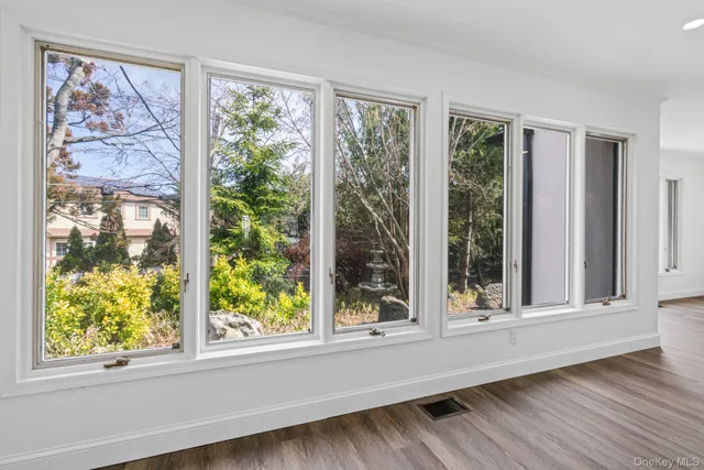 a view of a room that has a window