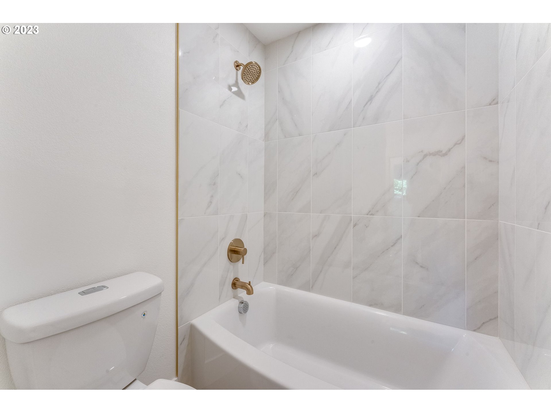 3842 North Alaska Street Portland, OR 97217 - Photo 23 of 36 a bathroom with a sink a toilet and shower