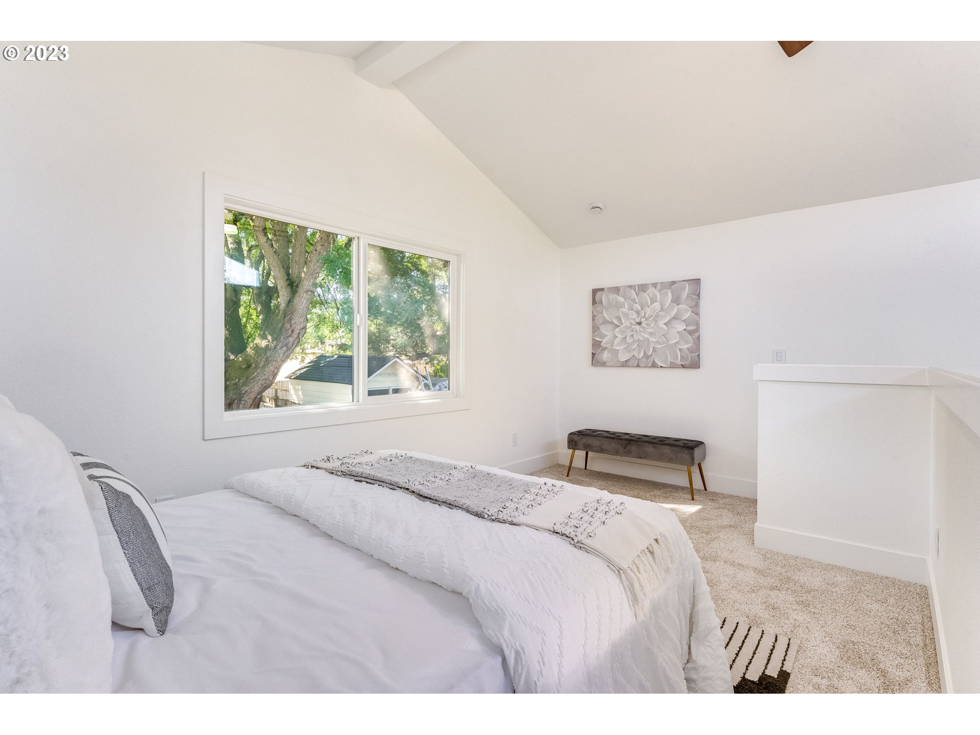3842 North Alaska Street Portland, OR 97217 - Photo 29 of 36 a bedroom with a bed and a window