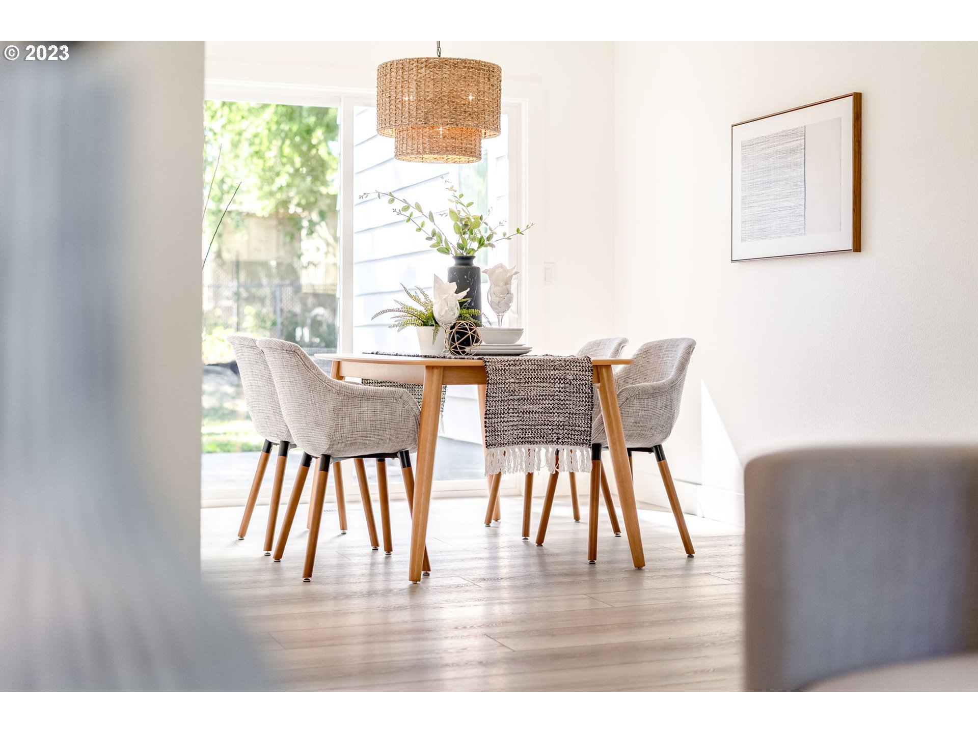 3842 North Alaska Street Portland, OR 97217 - Photo 7 of 36 a dining room with furniture and wooden floor