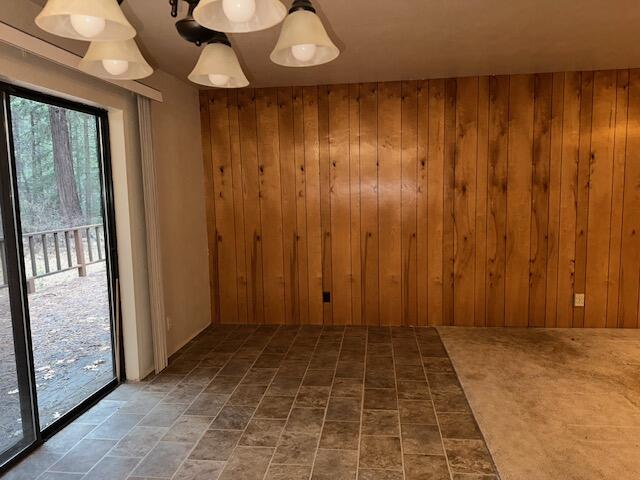 7722 Hidden Meadows Road Shingletown, CA 96088 - Photo 6 of 12 a view of a room with a door and wooden floor